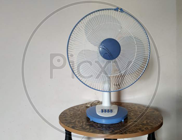 Electric Table Fan Blue Color isolated on white background