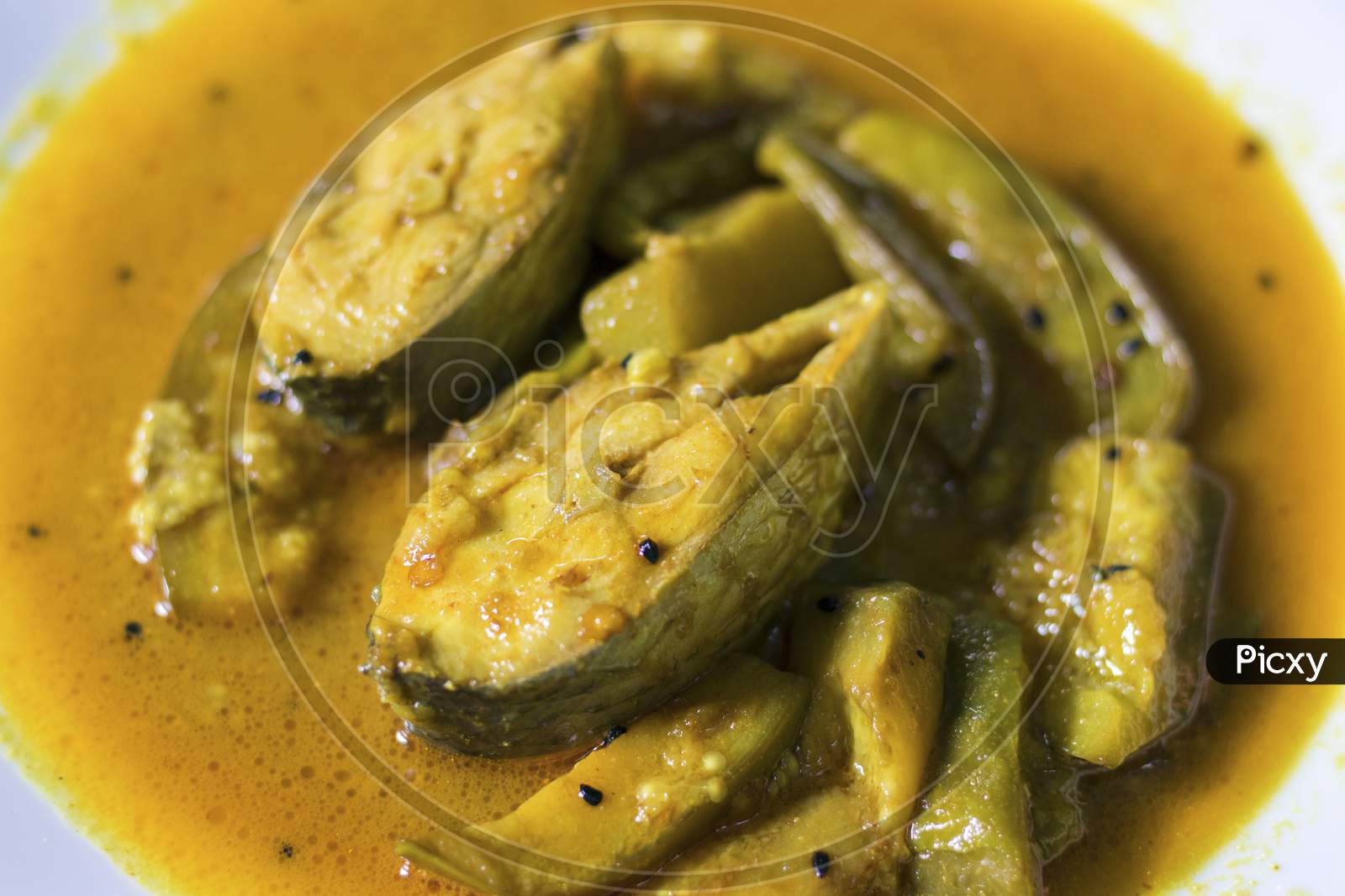 famous Bengali dish hilsha/Ilish with brinjal/Eggplant recipe.