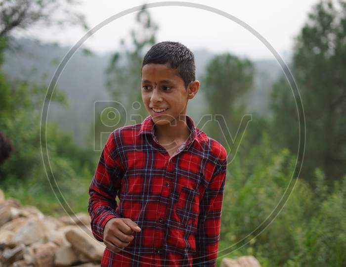 Almora, India - September 06, 2020: Portrait Of A Pahadi Boy With Tilak On His Forehead. Fun And Happy Concept.