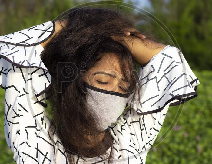 Stylish Woman Wearing Protective Face Mask,