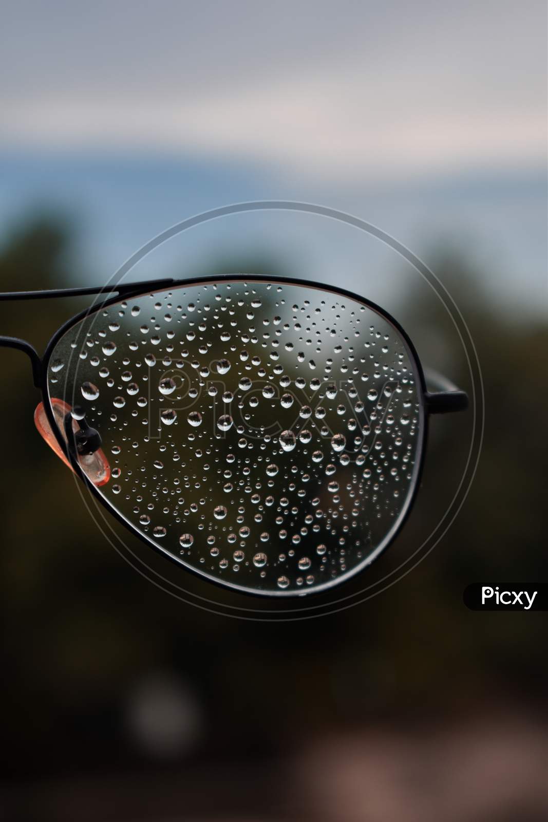 Water droplets on specs