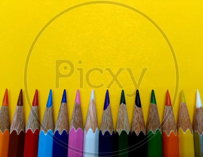 Colour Pencil With Yellow Background,Pencil Sketch