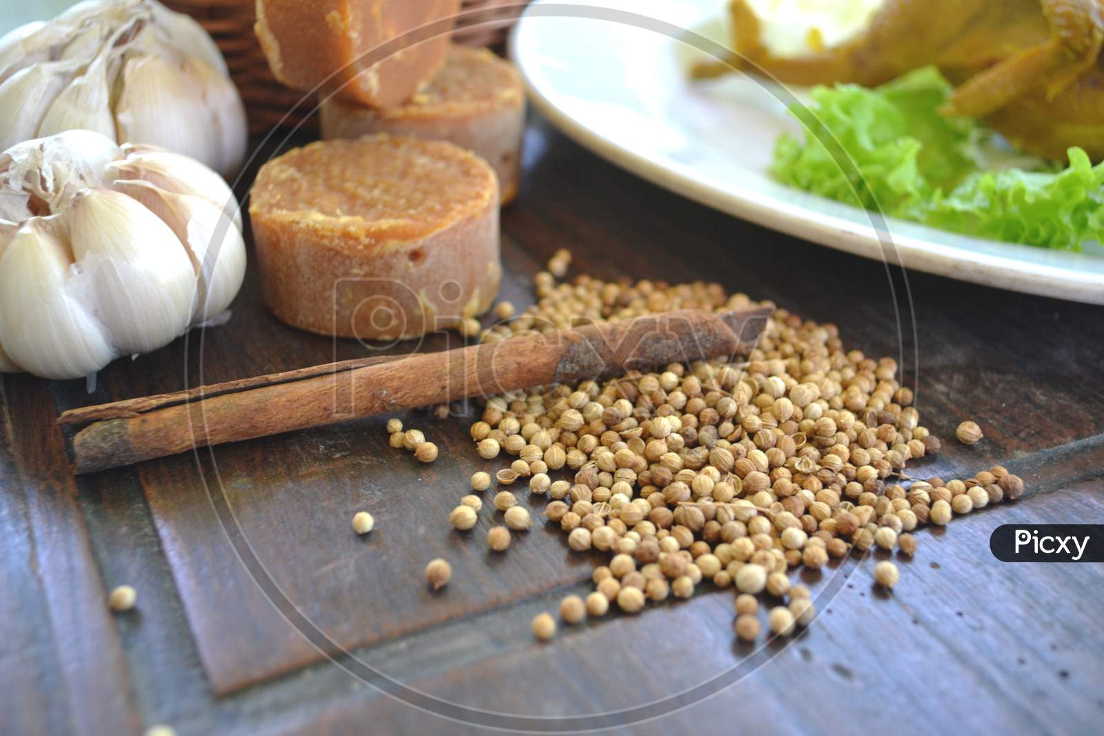 Coriander Seeds And Cinnamon On A Wooden Table, Indonesian Spices
