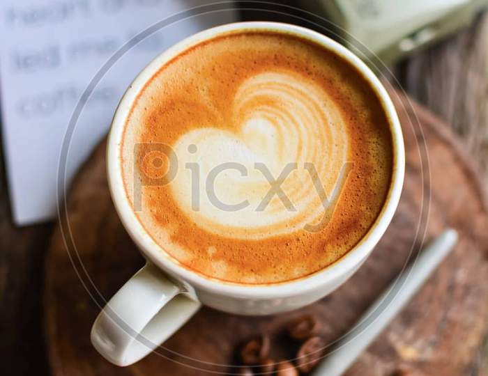 Latte art heart coffee cup