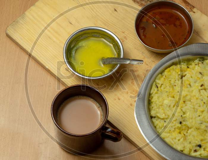 Tasty and healthy breakfast Pongal with ghee and chutney