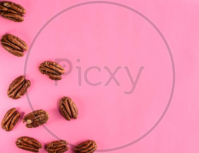 Walnuts On Pink Background, Empty Space