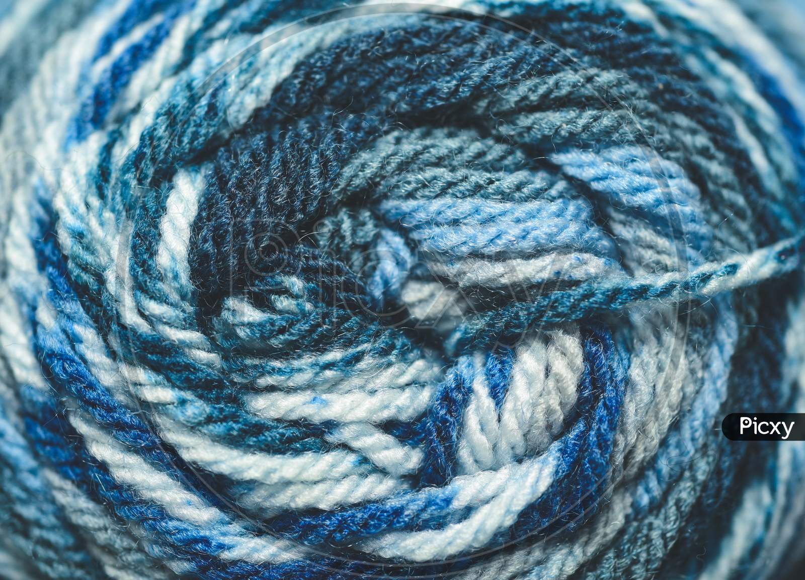 Macro Close Up Of Blue Tones Worsted Yarn