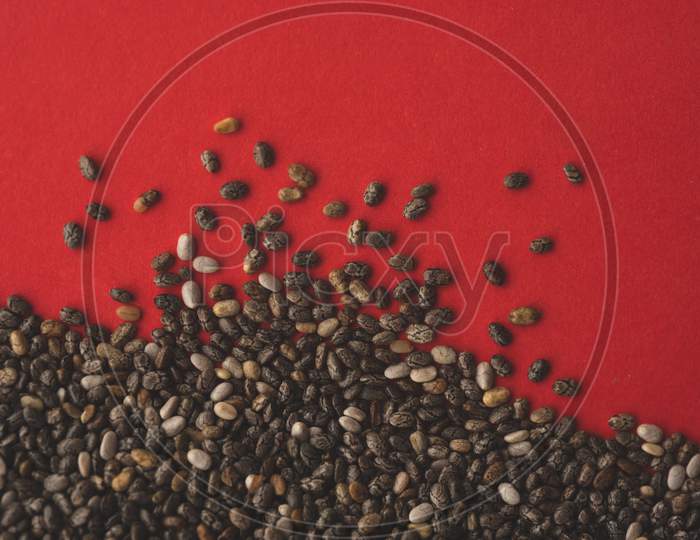 Chia Seeds Macro Photography With Red Background