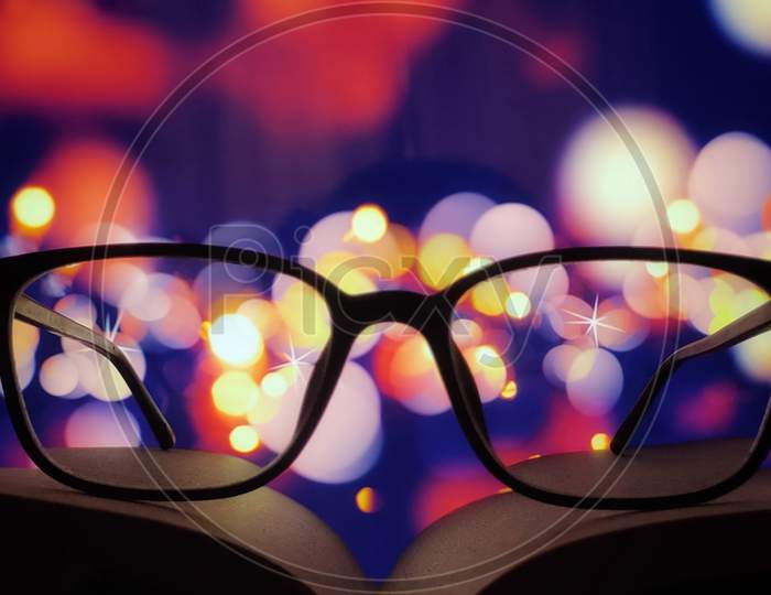 Eye glasses on the book