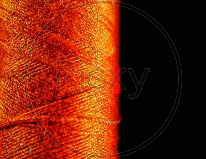 macroshot of thread reel