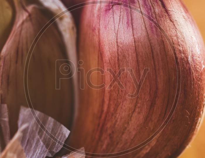 Macro Close Up Of  Garlic Clove / Skin Texture