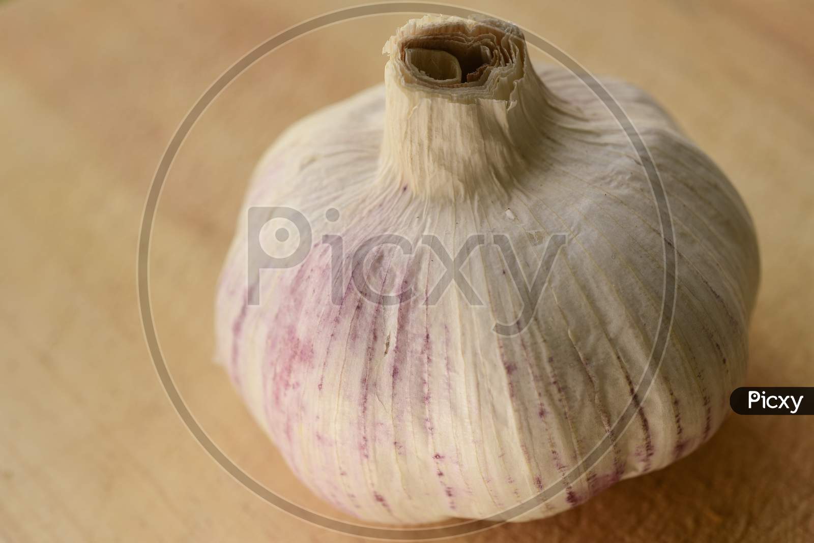 Nice Close Up Of Garlic On A Wooden Chopping Board