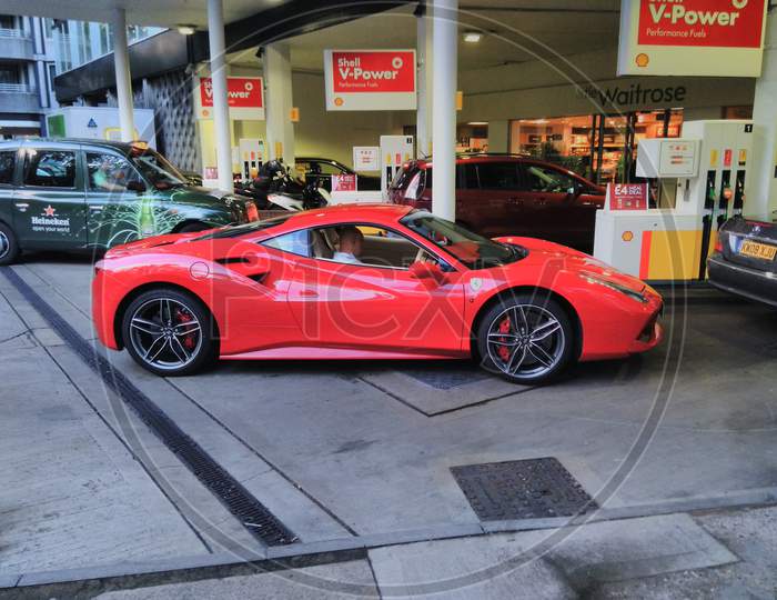 Ferrari 458 Italia at petrol pump