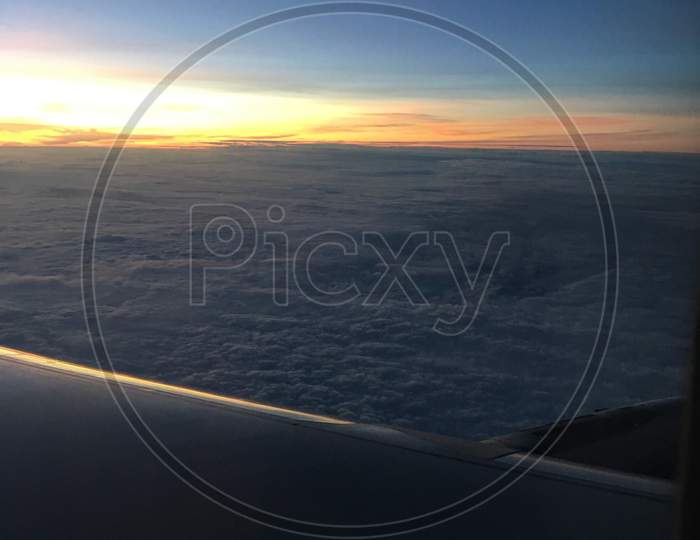 Sky through airplane window