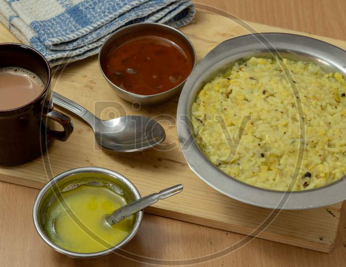 Tasty and healthy breakfast Pongal with ghee and chutney