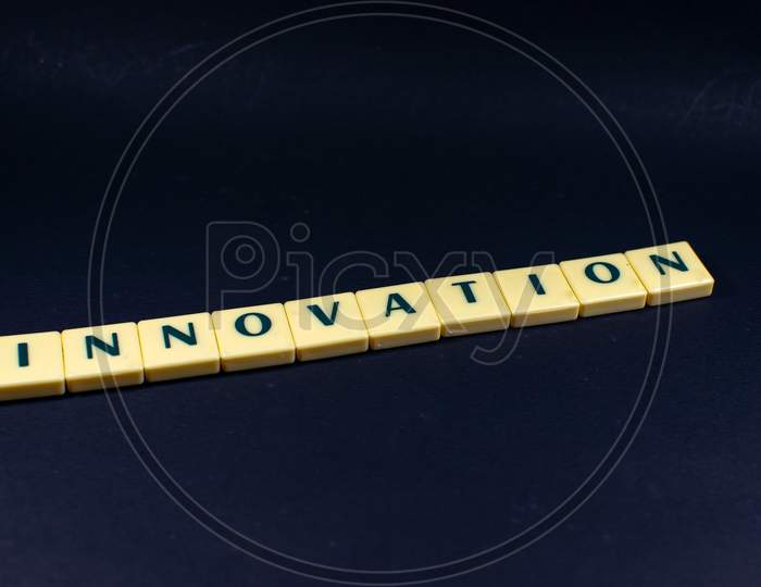 Innovation word concept black texture background image using by block letter for English language learning concept
