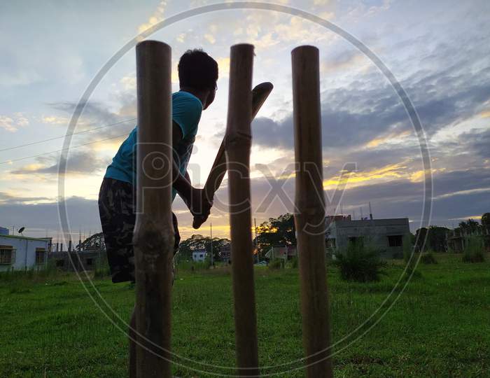 Playing cricket in the afternoon