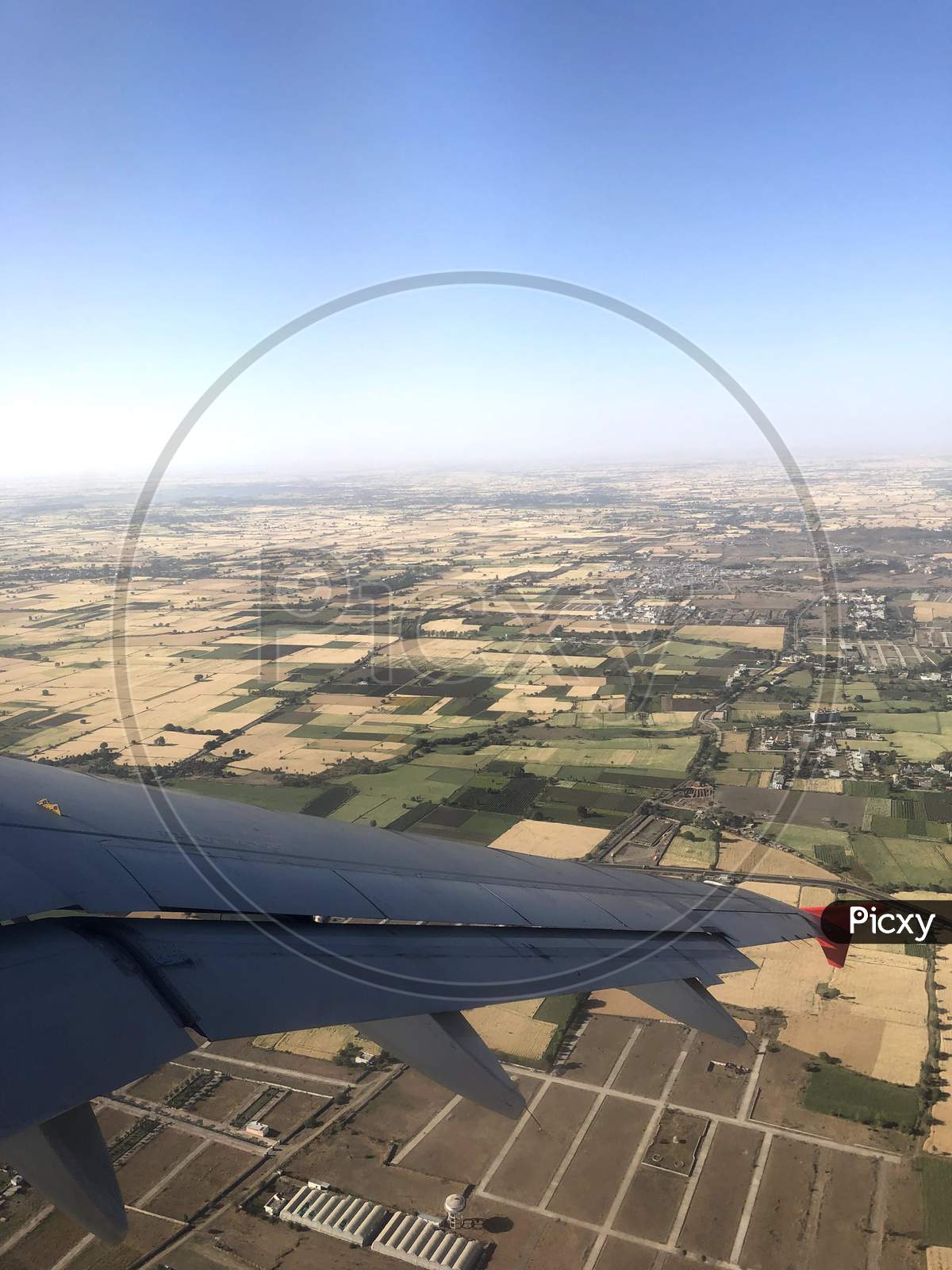 Land view through Airplane window