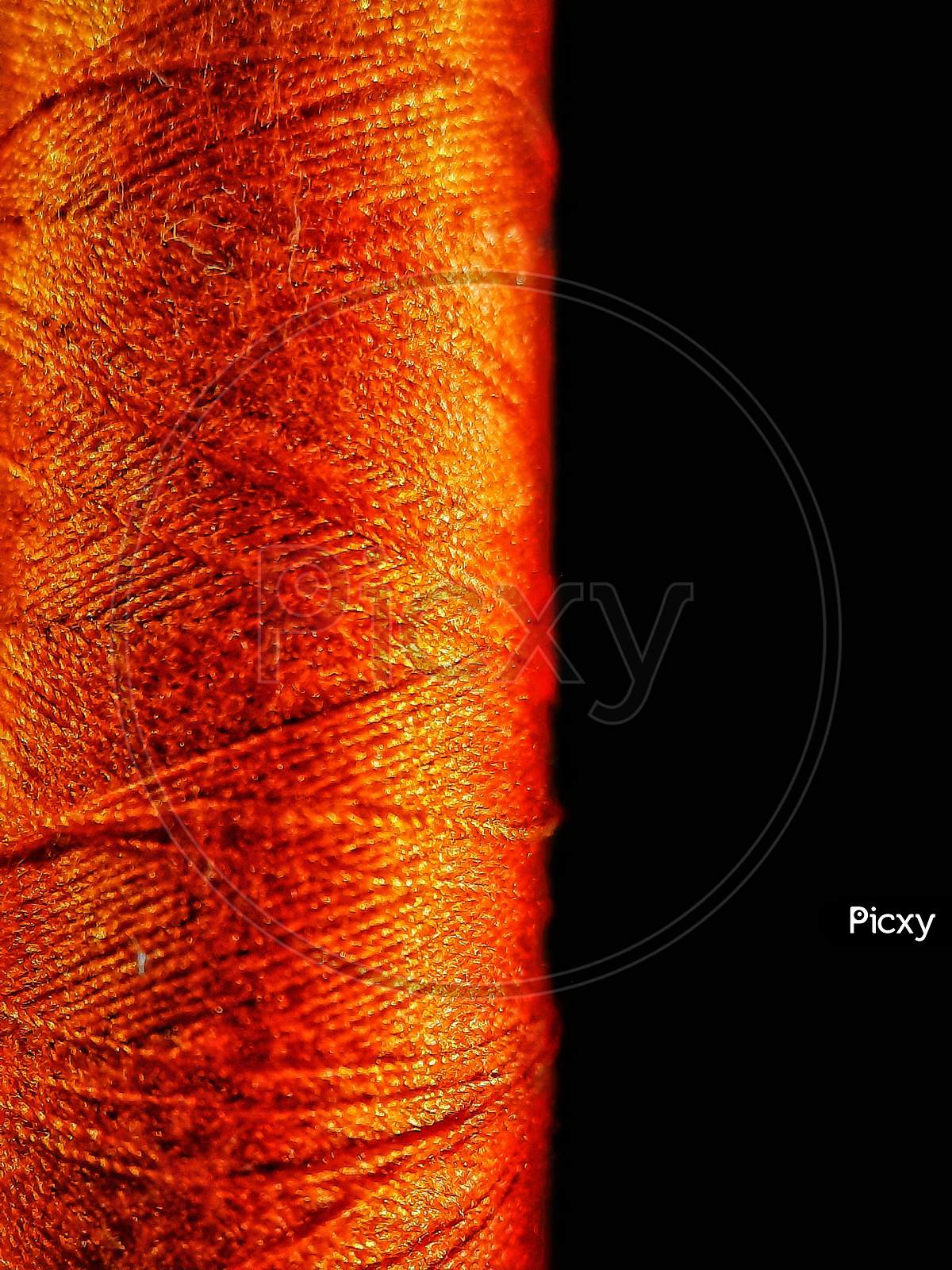 macroshot of thread reel