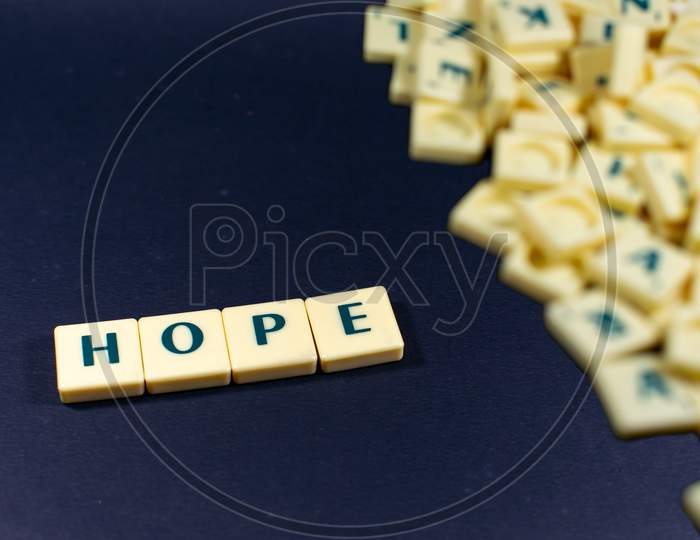 Hope word concept black texture background image using by block letter for English language learning concept