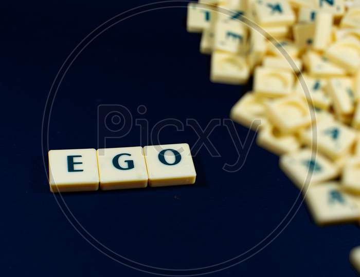 Ego word concept black texture background image using by block letter for English language learning concept