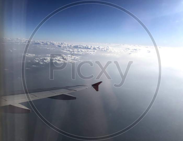 Sky through airplane window