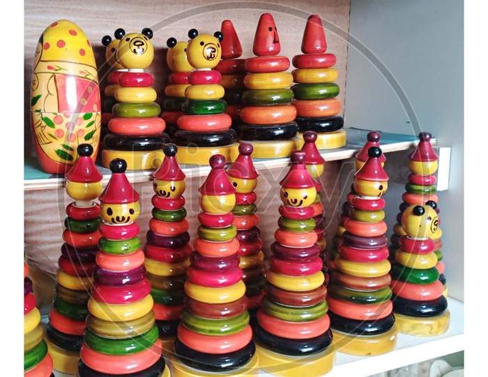 Colourful ring wooden stacking doll figures from Channapatna toy town