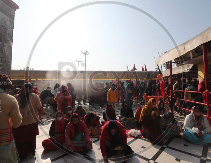 People  pay obeisance at Kali Mata Temple on the first day of New Year 2021, in Jammu ,1 January,2021.