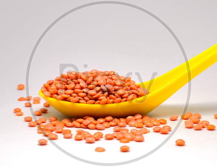 Red Lentil Isolated On A White Background