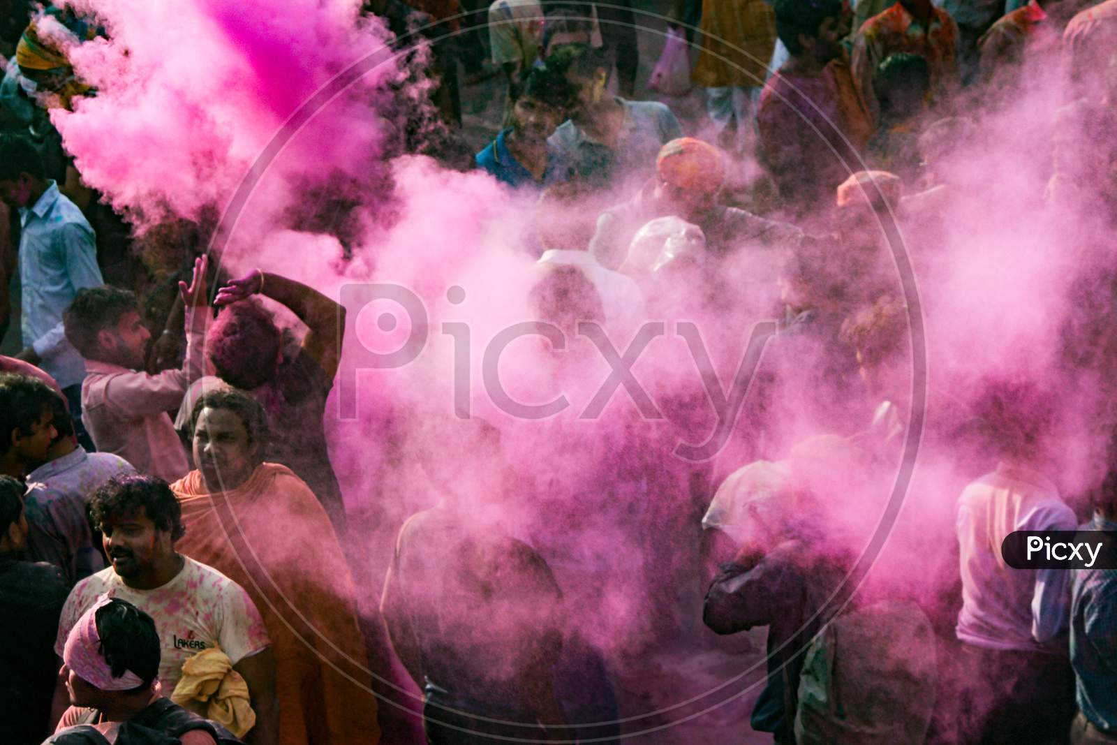 Mathura, Uttar Pradesh/ India- January 6 2020: People Throw Colors To Each Other Celebrate The Traditional And A Ritualistic Colorful Holi With Dance And Colored Faces At Mathura Street.