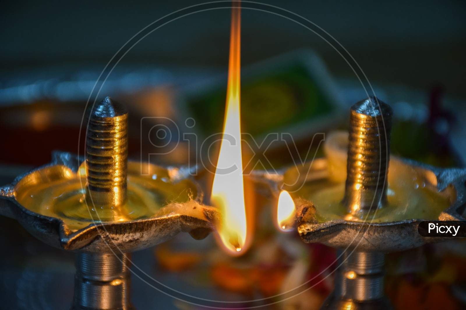 Close Up Of Beautiful Silver Oil Lamp On Blur Background