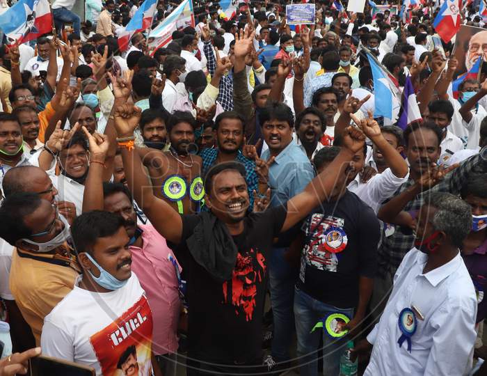 Fans of superstar Rajinikanth stage a demonstration demanding from him to join politics as earlier as promised, at Valluvar Kottam in Chennai, Sunday, Jan. 10, 2021. The actor, who finally appeared ready to launch his political party with a "now or never" announcement about a month ago, has now deci