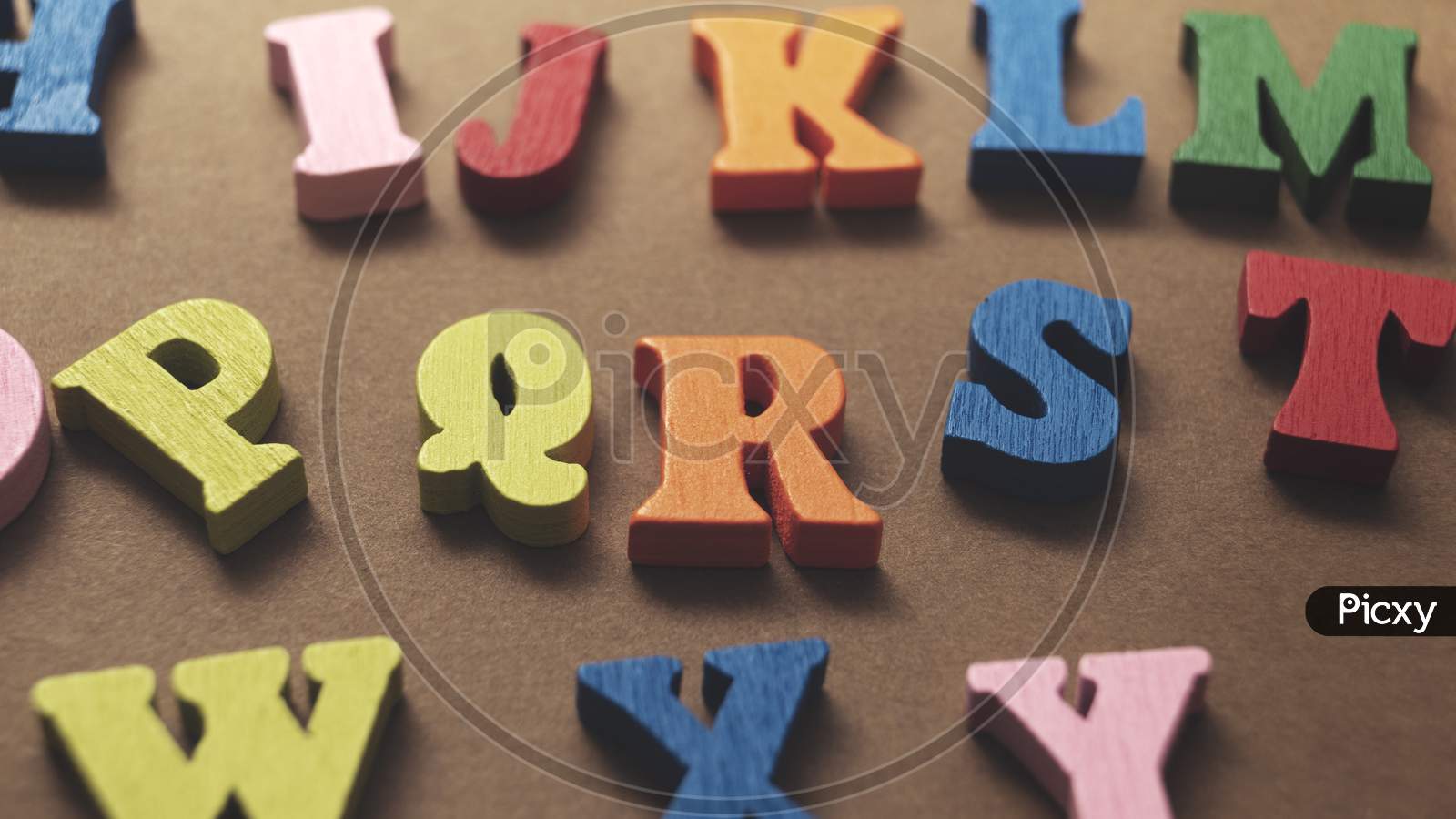 Colorful Wooden Letters On Wooden Background