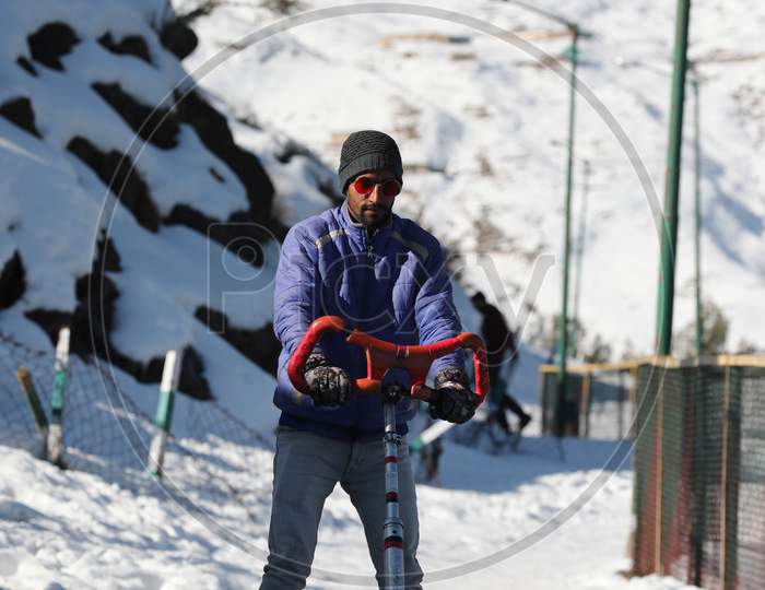 Tourist Play Snow Cart Drive At Nathatop About 110 Km From Jammu On Sunday.10 Jan,2021.
