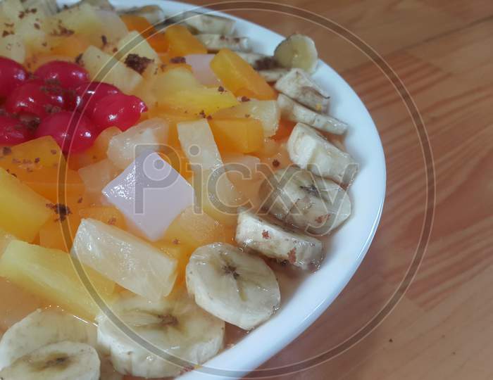 Creamy Tasty Sweet Fruit Trifle With Banana Slices Layered On Surface