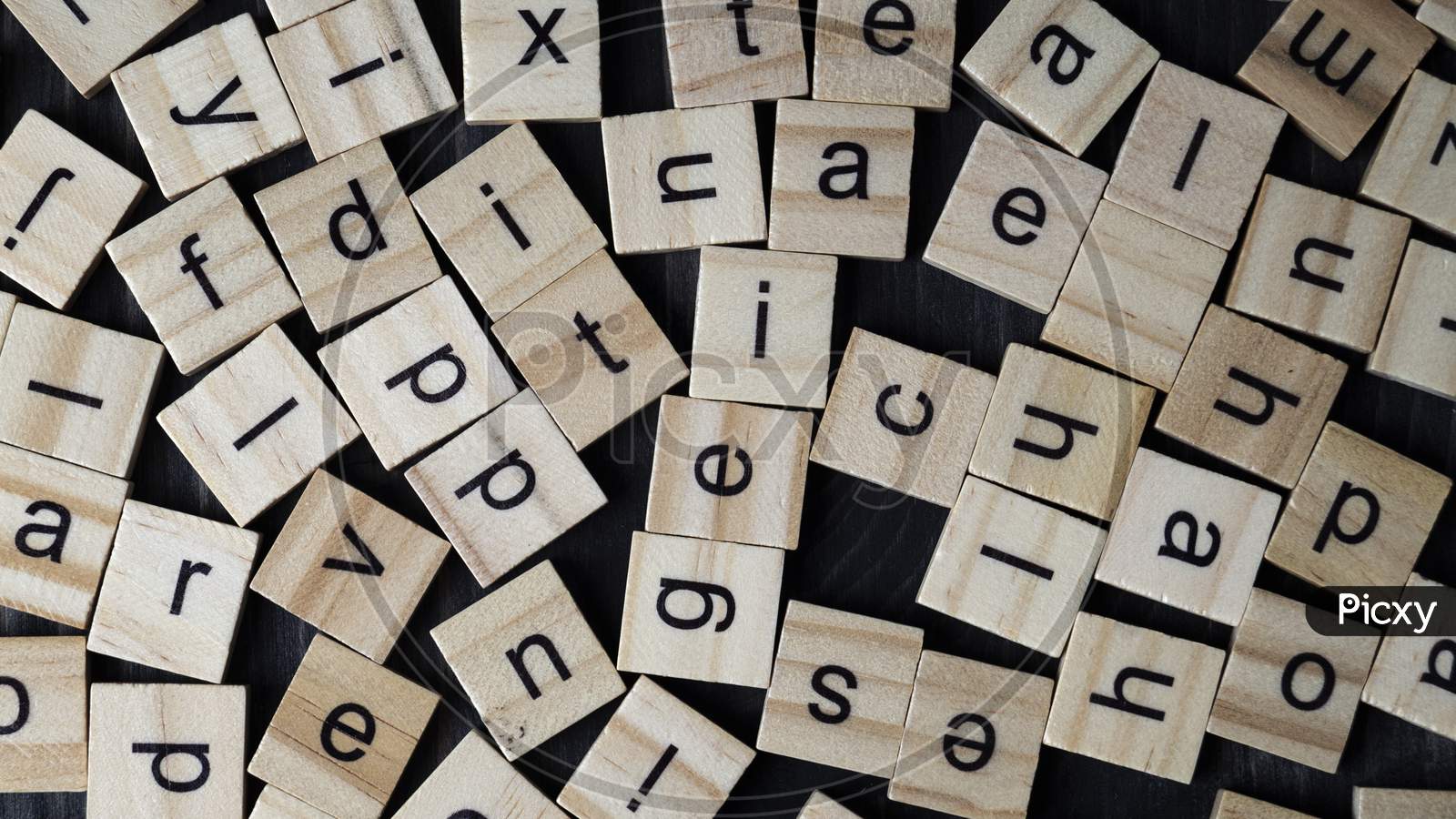 Alphabet Letters On Wooden Scrabble Pieces