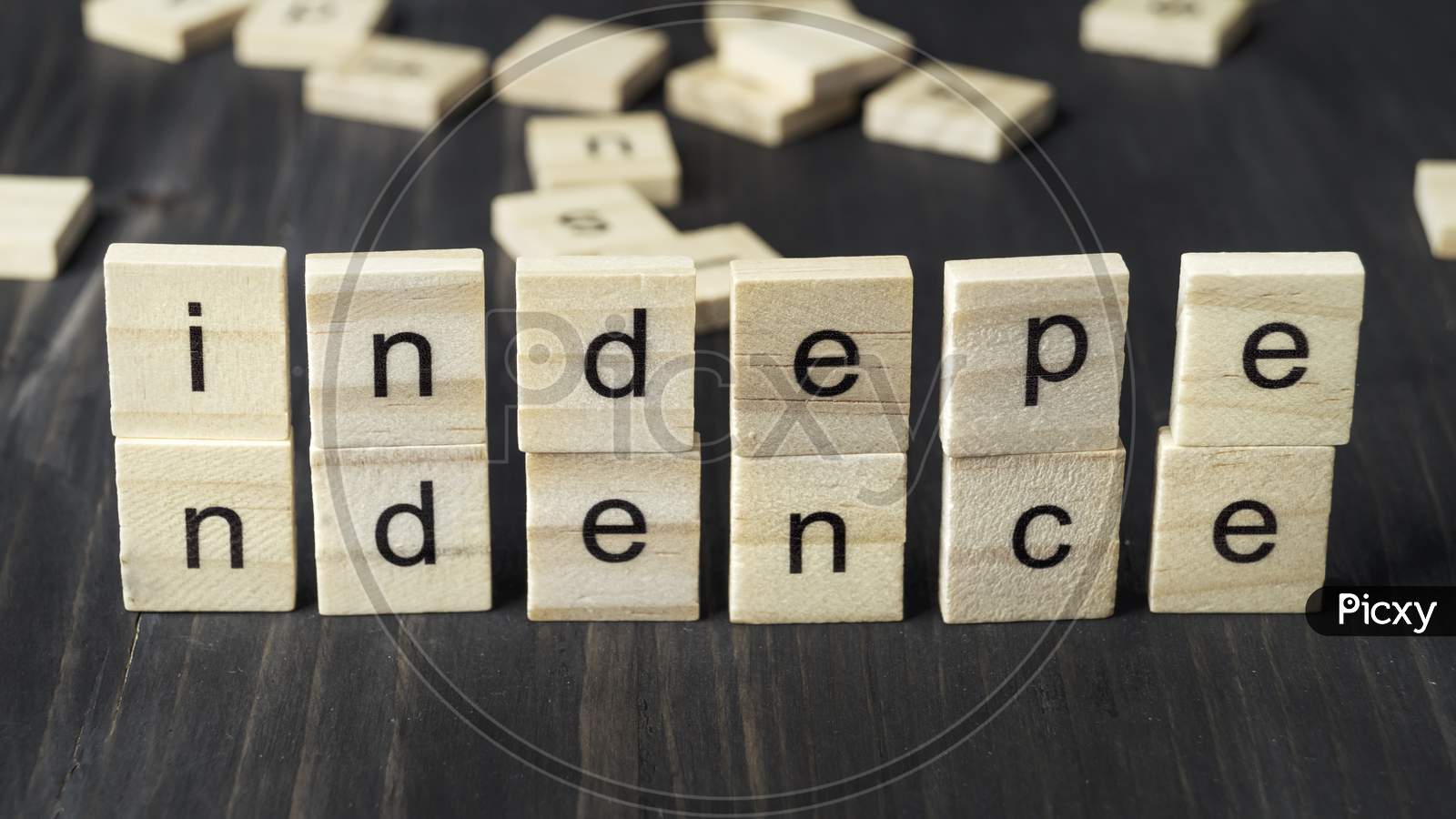 Word  Independence Written On Wooden Blocks