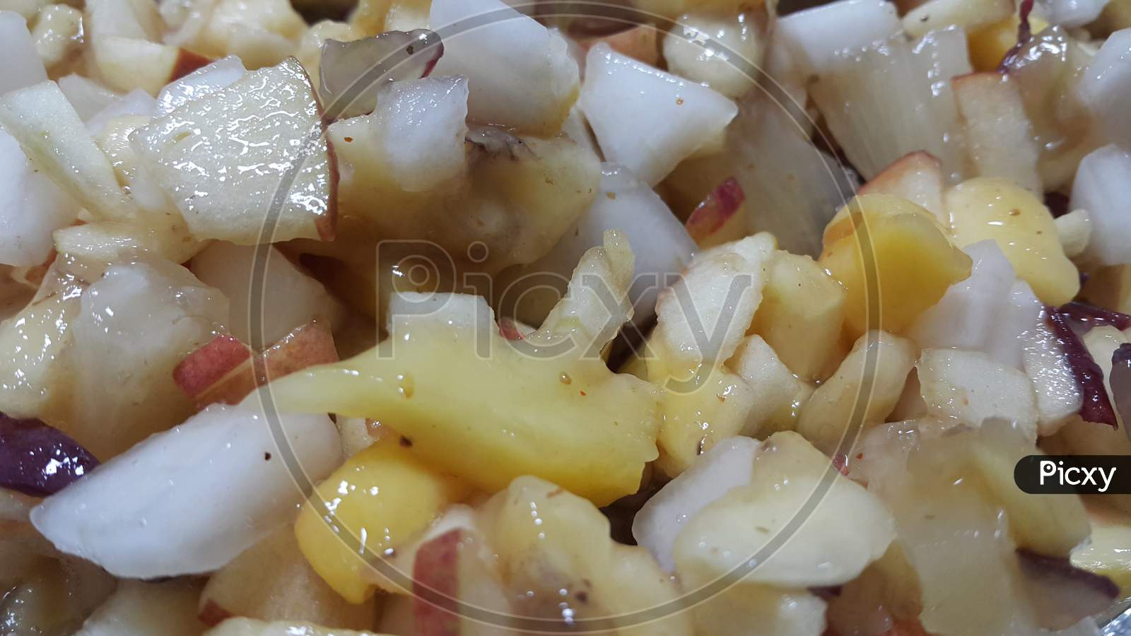 Closeup View Of Fresh Tasty And Spicy Homemade Fruit Chaat Dish.