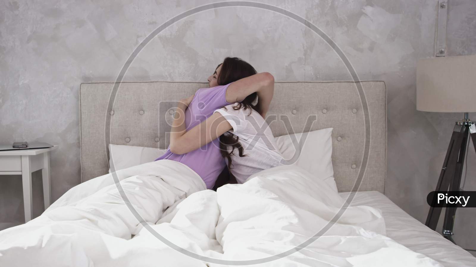 Image of Couple Cuddling In Bed. Couple In Bed Morning-CV098551-Picxy