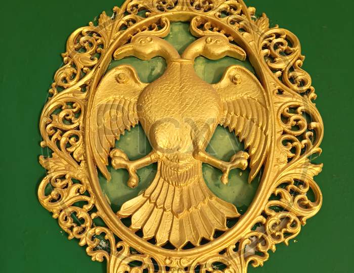 A Classic Picture of the State Emblem 'Gandaberunda' or the Two headed Mythological bird of the Maharajahs of Mysore hung inside the  Lalitha Mahal Palace in Karnataka.