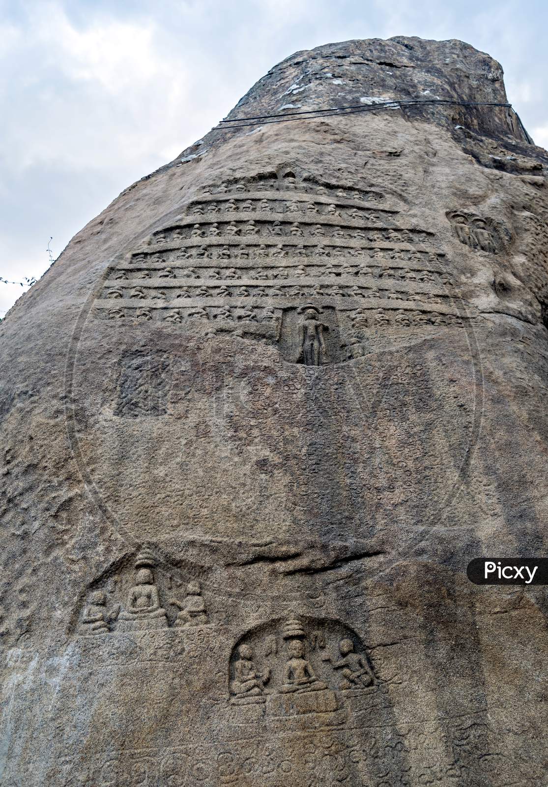 Ancient carved artifacts on huge stone located on Vindyagiri at Shravanbelagola in the Indian state of Karnataka.