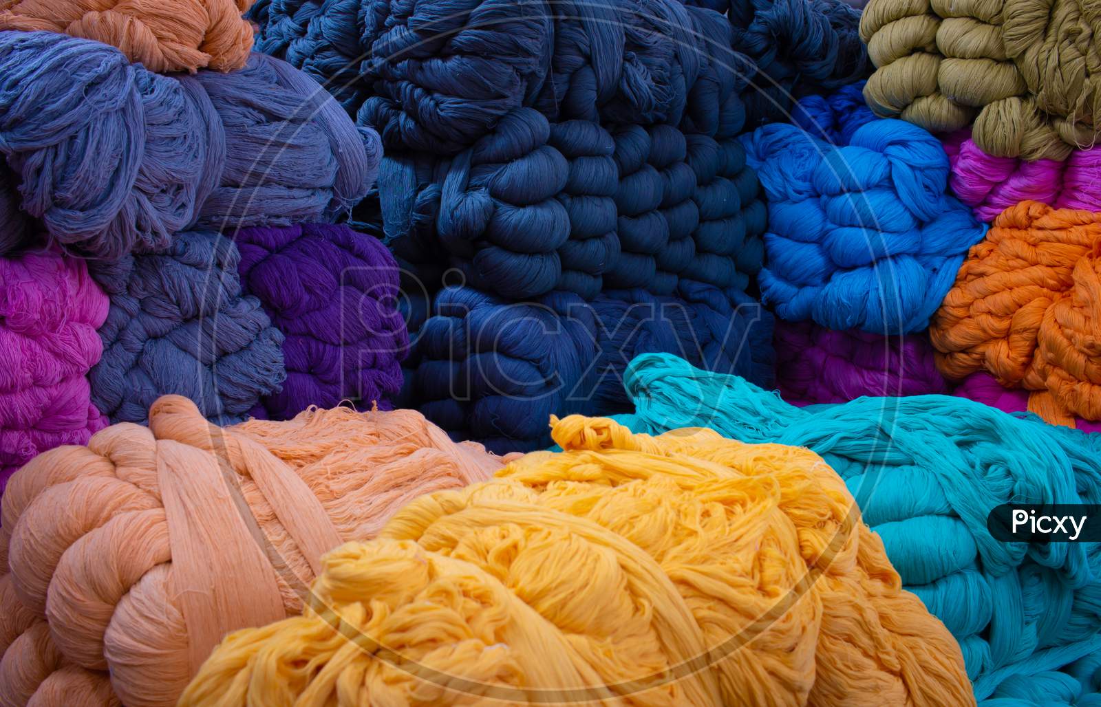 View Of The Multi-Colored Thread Yarns Used In Textile Industry