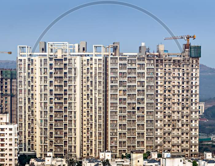 Twin, Tall Residential Buildings Under Construction In Pune, Maharashtra, India.