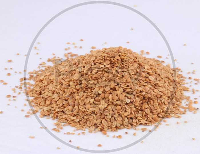 Split Roasted Coriander Seeds Also Know As Dhana Dal Or Sukh Mukh Isolated On White Background