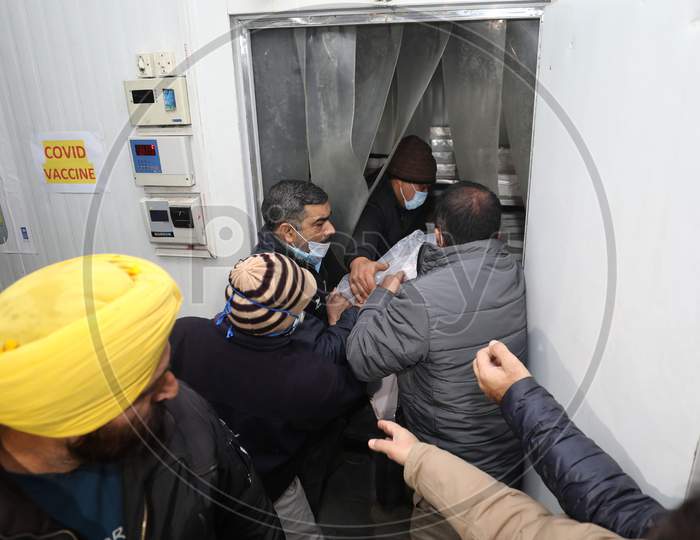 The first consignment of COVID-19 vaccination arrives at a storage facility, in Jammu ,13,JAN,2021.