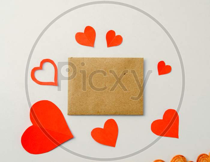 Valentines Day background with Red hearts,ribbon, message card,gift box and Heart-shaped cookies isolated on white background