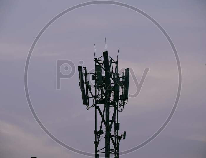 Mobile Network Tower , Background Blue Sky. Selective Focus On Subject