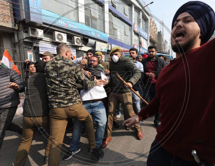 Congress workers stage a protest against Centre's new farm laws and hike in prices of fuel and other necessary goods,in Jammu on Friday,15,Jan,2021.