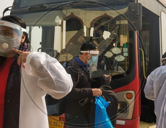 Delhi,India-12/28/2020; Female Passenger Wearing Personal Protective Equipments (Ppe Kit) At Airport During Covid 19 Spread