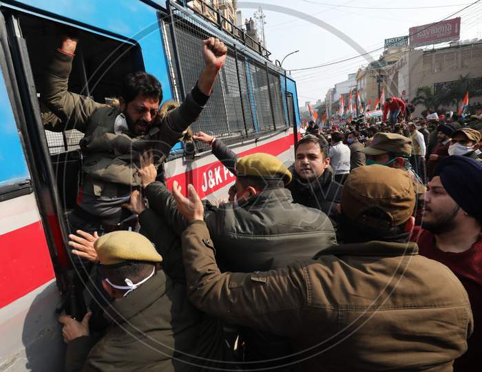 Congress workers stage a protest against Centre's new farm laws and hike in prices of fuel and other necessary goods,in Jammu on Friday,15,Jan,2021.